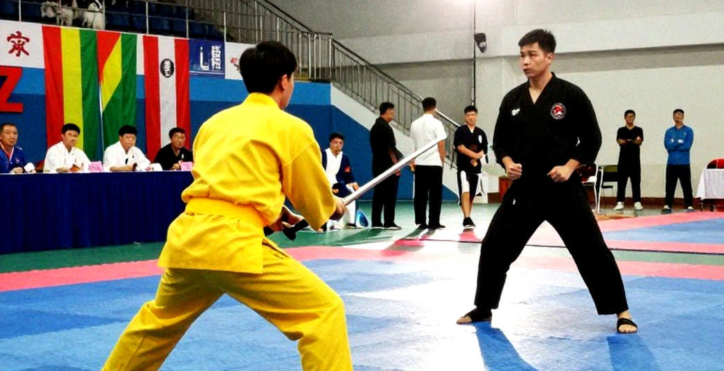 Đinh Văn Tâm và Ou Jiaming ở chung kết sanda 56kg Asian Games 2026: Trận đấu cân bằng hơn nhãn 'tinh túy kung fu'